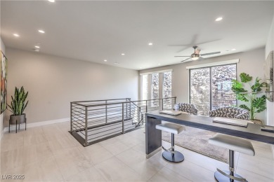 Experience elevated living in this stunning 3-story modern on Dragon Ridge Country Club in Nevada - for sale on GolfHomes.com, golf home, golf lot