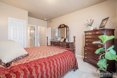 This stunning custom home is nestled at the end of a serene on Highland Meadows Golf Course in Colorado - for sale on GolfHomes.com, golf home, golf lot