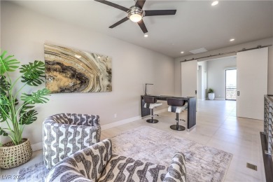 Experience elevated living in this stunning 3-story modern on Dragon Ridge Country Club in Nevada - for sale on GolfHomes.com, golf home, golf lot