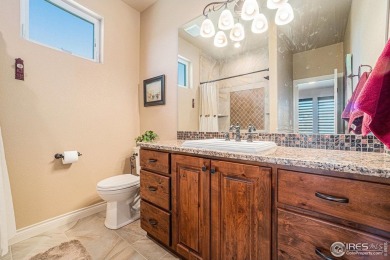 This stunning custom home is nestled at the end of a serene on Highland Meadows Golf Course in Colorado - for sale on GolfHomes.com, golf home, golf lot