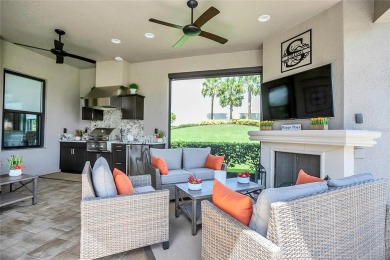 Discover luxurious comfort in this stunning on Esplanade Golf and Country at Lakewood Ranch in Florida - for sale on GolfHomes.com, golf home, golf lot