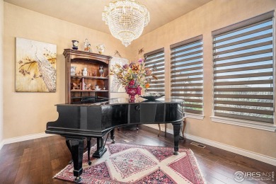 This stunning custom home is nestled at the end of a serene on Highland Meadows Golf Course in Colorado - for sale on GolfHomes.com, golf home, golf lot