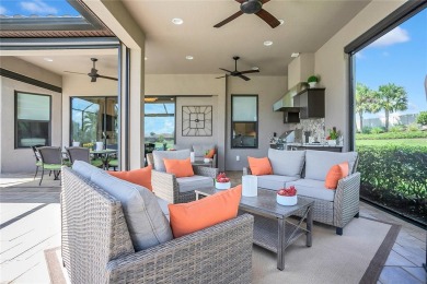 Discover luxurious comfort in this stunning on Esplanade Golf and Country at Lakewood Ranch in Florida - for sale on GolfHomes.com, golf home, golf lot