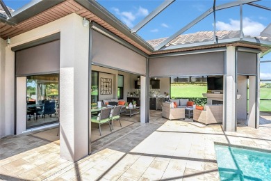 Discover luxurious comfort in this stunning on Esplanade Golf and Country at Lakewood Ranch in Florida - for sale on GolfHomes.com, golf home, golf lot