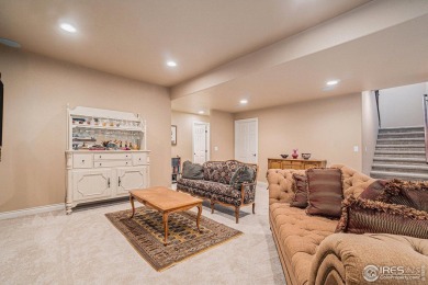 This stunning custom home is nestled at the end of a serene on Highland Meadows Golf Course in Colorado - for sale on GolfHomes.com, golf home, golf lot