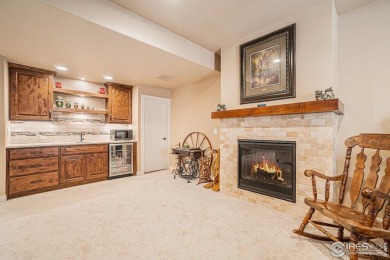 This stunning custom home is nestled at the end of a serene on Highland Meadows Golf Course in Colorado - for sale on GolfHomes.com, golf home, golf lot