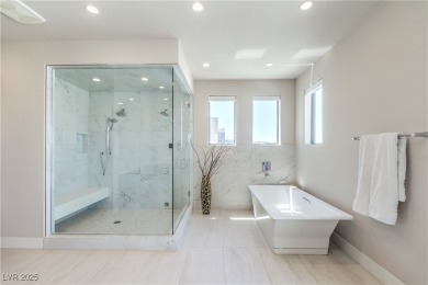Experience elevated living in this stunning 3-story modern on Dragon Ridge Country Club in Nevada - for sale on GolfHomes.com, golf home, golf lot