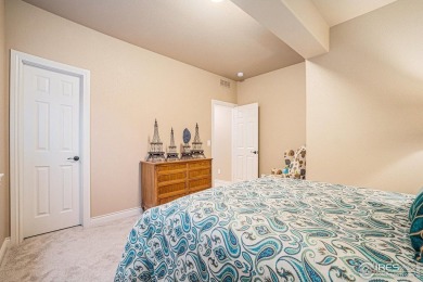 This stunning custom home is nestled at the end of a serene on Highland Meadows Golf Course in Colorado - for sale on GolfHomes.com, golf home, golf lot
