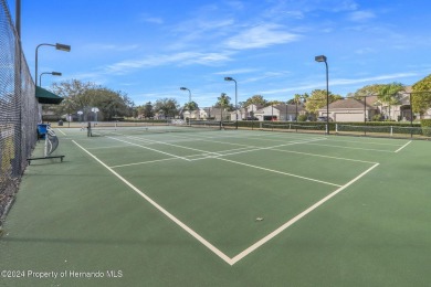 Check Out this Attached Villa with Extra Large Yard in the on Silverthorn Country Club in Florida - for sale on GolfHomes.com, golf home, golf lot