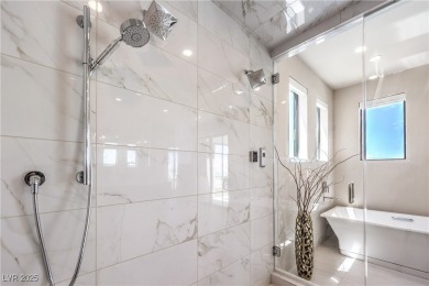 Experience elevated living in this stunning 3-story modern on Dragon Ridge Country Club in Nevada - for sale on GolfHomes.com, golf home, golf lot