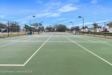 Check Out this Attached Villa with Extra Large Yard in the on Silverthorn Country Club in Florida - for sale on GolfHomes.com, golf home, golf lot
