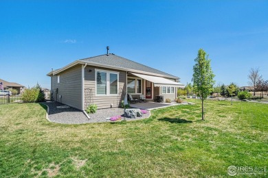 This stunning custom home is nestled at the end of a serene on Highland Meadows Golf Course in Colorado - for sale on GolfHomes.com, golf home, golf lot