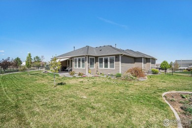 This stunning custom home is nestled at the end of a serene on Highland Meadows Golf Course in Colorado - for sale on GolfHomes.com, golf home, golf lot