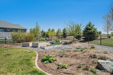 This stunning custom home is nestled at the end of a serene on Highland Meadows Golf Course in Colorado - for sale on GolfHomes.com, golf home, golf lot
