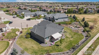 This stunning custom home is nestled at the end of a serene on Highland Meadows Golf Course in Colorado - for sale on GolfHomes.com, golf home, golf lot