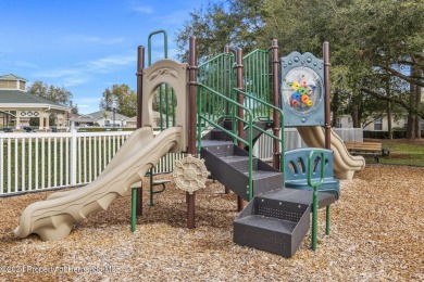 Check Out this Attached Villa with Extra Large Yard in the on Silverthorn Country Club in Florida - for sale on GolfHomes.com, golf home, golf lot