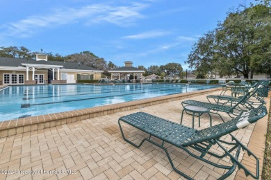 Check Out this Attached Villa with Extra Large Yard in the on Silverthorn Country Club in Florida - for sale on GolfHomes.com, golf home, golf lot
