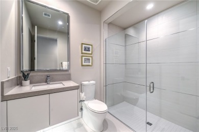 Experience elevated living in this stunning 3-story modern on Dragon Ridge Country Club in Nevada - for sale on GolfHomes.com, golf home, golf lot