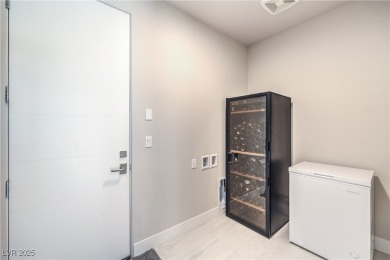 Experience elevated living in this stunning 3-story modern on Dragon Ridge Country Club in Nevada - for sale on GolfHomes.com, golf home, golf lot