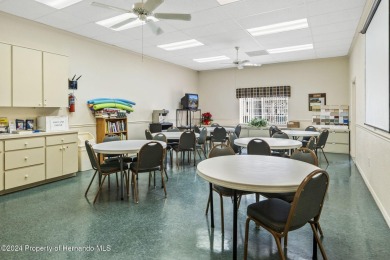 Check Out this Attached Villa with Extra Large Yard in the on Silverthorn Country Club in Florida - for sale on GolfHomes.com, golf home, golf lot