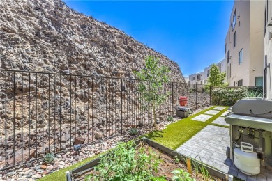 Experience elevated living in this stunning 3-story modern on Dragon Ridge Country Club in Nevada - for sale on GolfHomes.com, golf home, golf lot