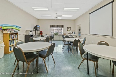 Check Out this Attached Villa with Extra Large Yard in the on Silverthorn Country Club in Florida - for sale on GolfHomes.com, golf home, golf lot