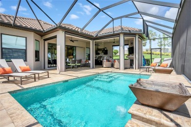 Discover luxurious comfort in this stunning on Esplanade Golf and Country at Lakewood Ranch in Florida - for sale on GolfHomes.com, golf home, golf lot