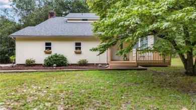 This fully updated home is nestled in a serene lake and golf on Seven Lakes Country Club in North Carolina - for sale on GolfHomes.com, golf home, golf lot