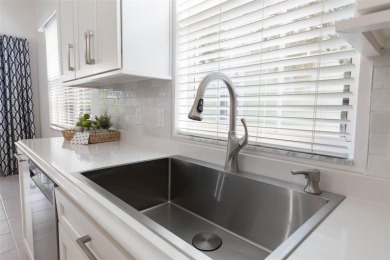 Imagine yourself living in the picturesque community of Halifax on Halifax Plantation Golf Club in Florida - for sale on GolfHomes.com, golf home, golf lot