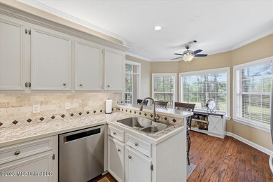 Tucked along the 8th hole tee box, this inviting golf course on Annandale Golf Club in Mississippi - for sale on GolfHomes.com, golf home, golf lot