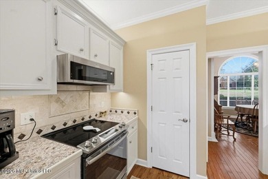 Tucked along the 8th hole tee box, this inviting golf course on Annandale Golf Club in Mississippi - for sale on GolfHomes.com, golf home, golf lot