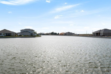 Discover this beautiful 3-bedroom, 2-bathroom lakeside home in on South Padre Island Golf Club in Texas - for sale on GolfHomes.com, golf home, golf lot