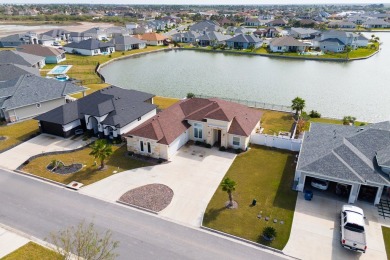 Discover this beautiful 3-bedroom, 2-bathroom lakeside home in on South Padre Island Golf Club in Texas - for sale on GolfHomes.com, golf home, golf lot