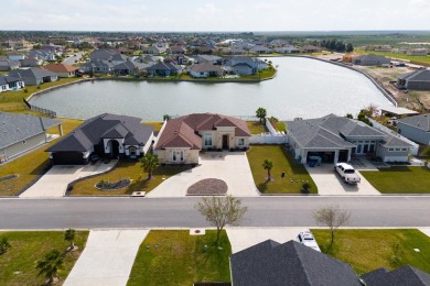 Discover this beautiful 3-bedroom, 2-bathroom lakeside home in on South Padre Island Golf Club in Texas - for sale on GolfHomes.com, golf home, golf lot