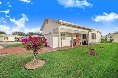 Welcome to this stunning home in a sought-after 55+ resort-style on Sweetwater Golf and Tennis Club in Florida - for sale on GolfHomes.com, golf home, golf lot