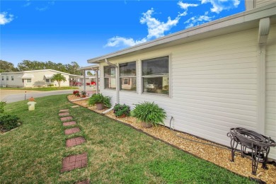 Welcome to this stunning home in a sought-after 55+ resort-style on Sweetwater Golf and Tennis Club in Florida - for sale on GolfHomes.com, golf home, golf lot