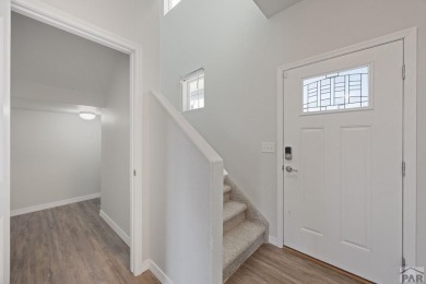 Welcome to 37 W Bonanza Drive, a stunning two-story home nestled on Desert Hawk At Pueblo West in Colorado - for sale on GolfHomes.com, golf home, golf lot