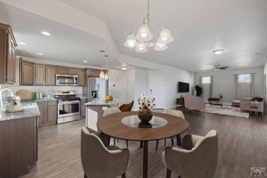 Welcome to 37 W Bonanza Drive, a stunning two-story home nestled on Desert Hawk At Pueblo West in Colorado - for sale on GolfHomes.com, golf home, golf lot