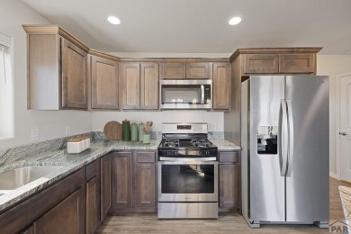 Welcome to 37 W Bonanza Drive, a stunning two-story home nestled on Desert Hawk At Pueblo West in Colorado - for sale on GolfHomes.com, golf home, golf lot