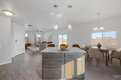 Welcome to 37 W Bonanza Drive, a stunning two-story home nestled on Desert Hawk At Pueblo West in Colorado - for sale on GolfHomes.com, golf home, golf lot