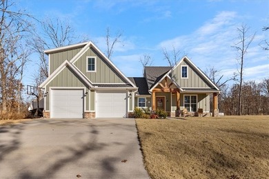 Custom home with high-end finishes and thoughtful design on Bella Vista Country Club - Highlands in Arkansas - for sale on GolfHomes.com, golf home, golf lot