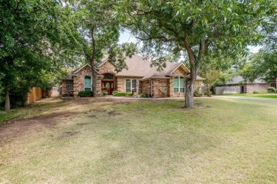 Welcome to this elegant 3-bedroom, 2.5-bath home located in the on Pecan Plantation Country Club in Texas - for sale on GolfHomes.com, golf home, golf lot