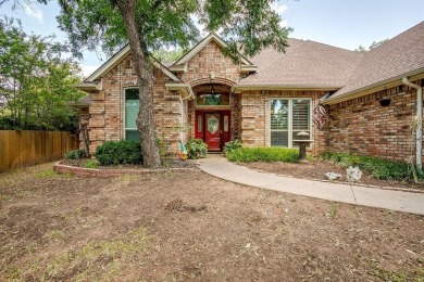 Welcome to this elegant 3-bedroom, 2.5-bath home located in the on Pecan Plantation Country Club in Texas - for sale on GolfHomes.com, golf home, golf lot