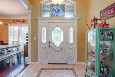 Welcome to this elegant 3-bedroom, 2.5-bath home located in the on Pecan Plantation Country Club in Texas - for sale on GolfHomes.com, golf home, golf lot