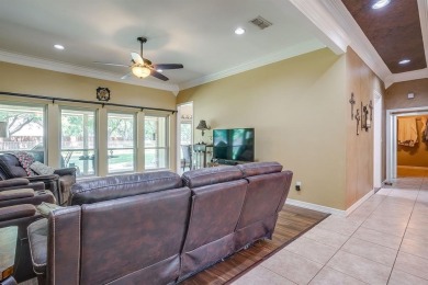 Welcome to this elegant 3-bedroom, 2.5-bath home located in the on Pecan Plantation Country Club in Texas - for sale on GolfHomes.com, golf home, golf lot