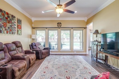 Welcome to this elegant 3-bedroom, 2.5-bath home located in the on Pecan Plantation Country Club in Texas - for sale on GolfHomes.com, golf home, golf lot