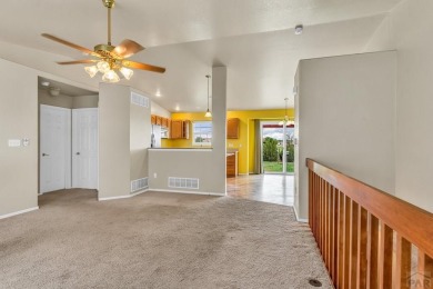 This 3-bedroom, 3-bathroom stucco home in Pueblo West offers on Desert Hawk At Pueblo West in Colorado - for sale on GolfHomes.com, golf home, golf lot