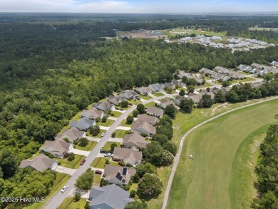 Discover the perfect blend of comfort and modern elegance at 119 on Belvedere Country Club in North Carolina - for sale on GolfHomes.com, golf home, golf lot