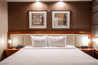 Panoramic Strip View Suite with balcony offering breathtaking on The Wynn Golf Club in Nevada - for sale on GolfHomes.com, golf home, golf lot