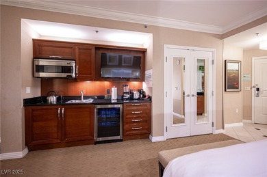 Panoramic Strip View Suite with balcony offering breathtaking on The Wynn Golf Club in Nevada - for sale on GolfHomes.com, golf home, golf lot